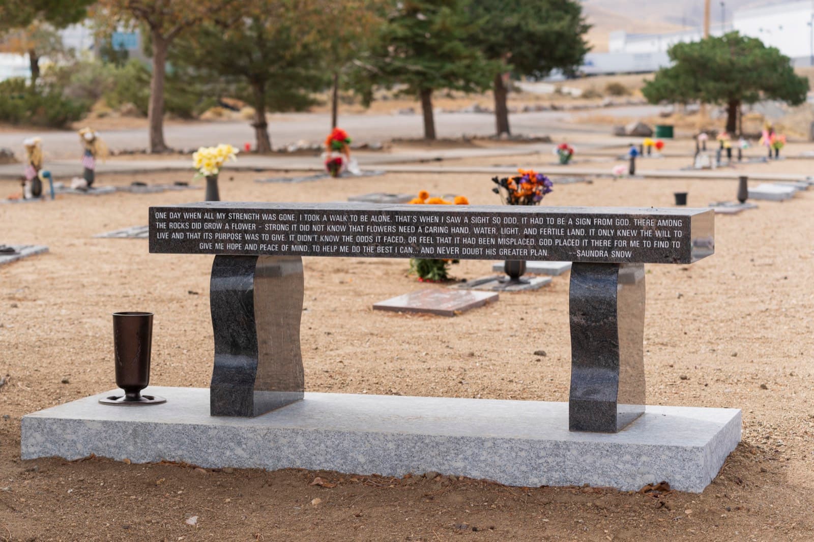 A quiet memorial bench on the grounds
