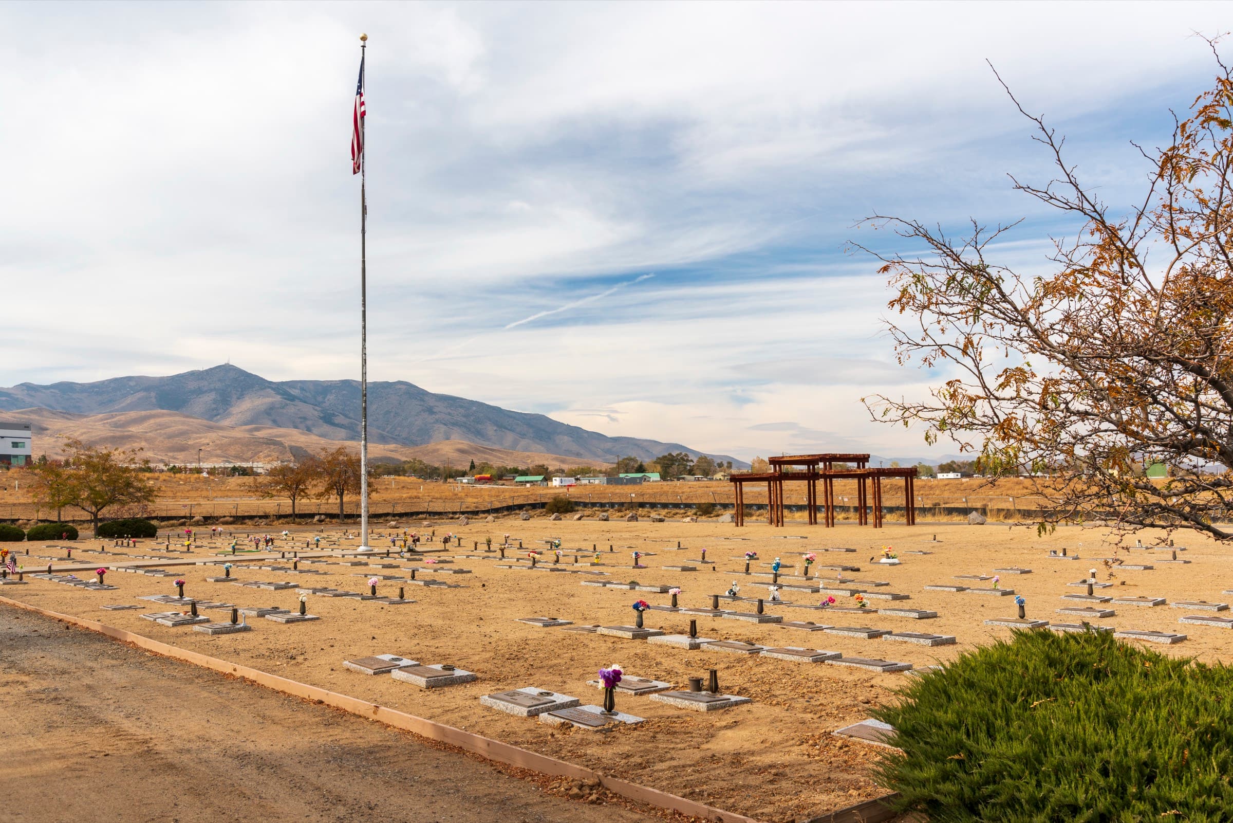 The grounds of Sierra Memorial Gardens with the American flag