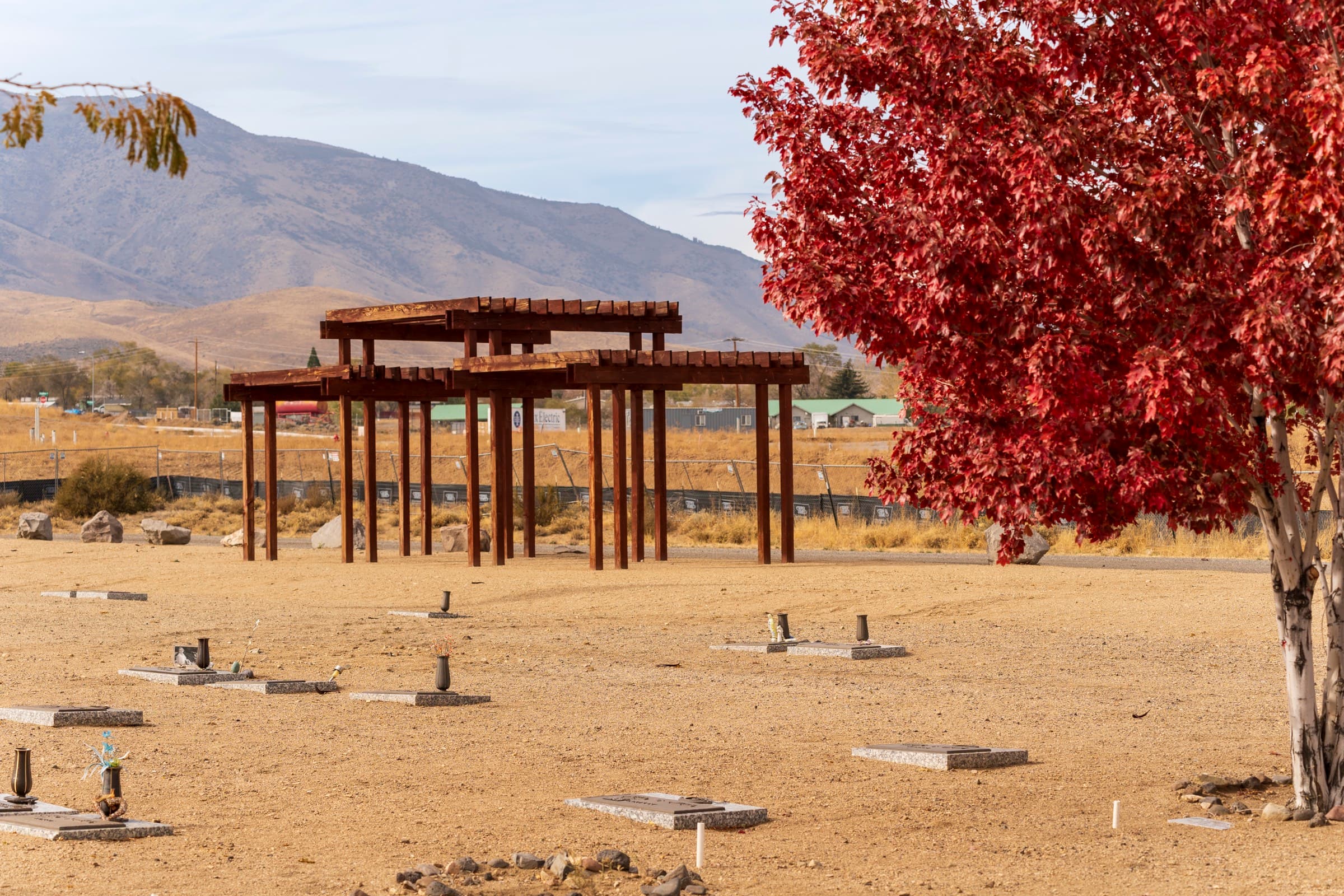 Pavilions and fall color framed by the Sierra Nevada mountains